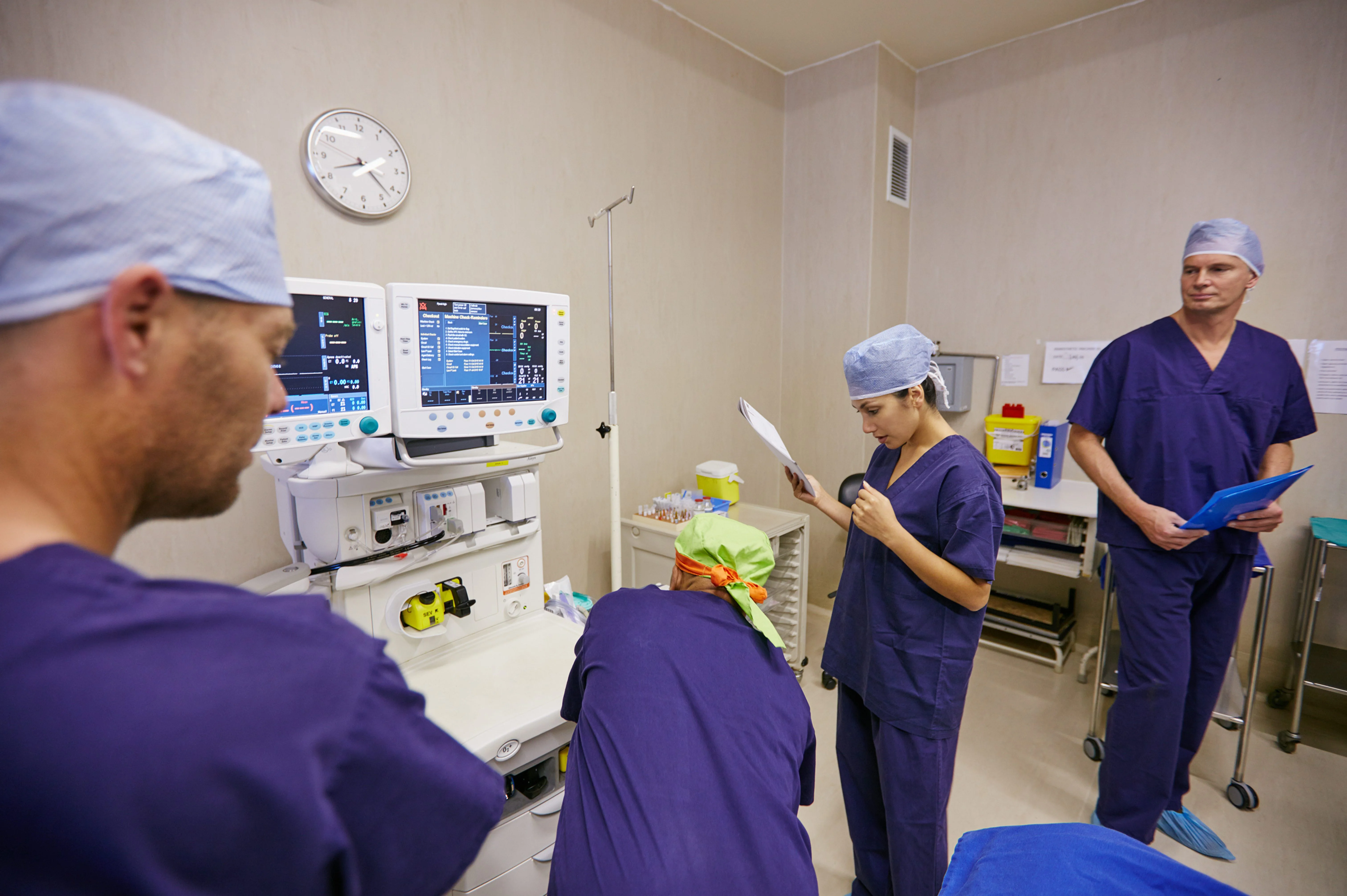Medical device sales team preparing clinical story materials